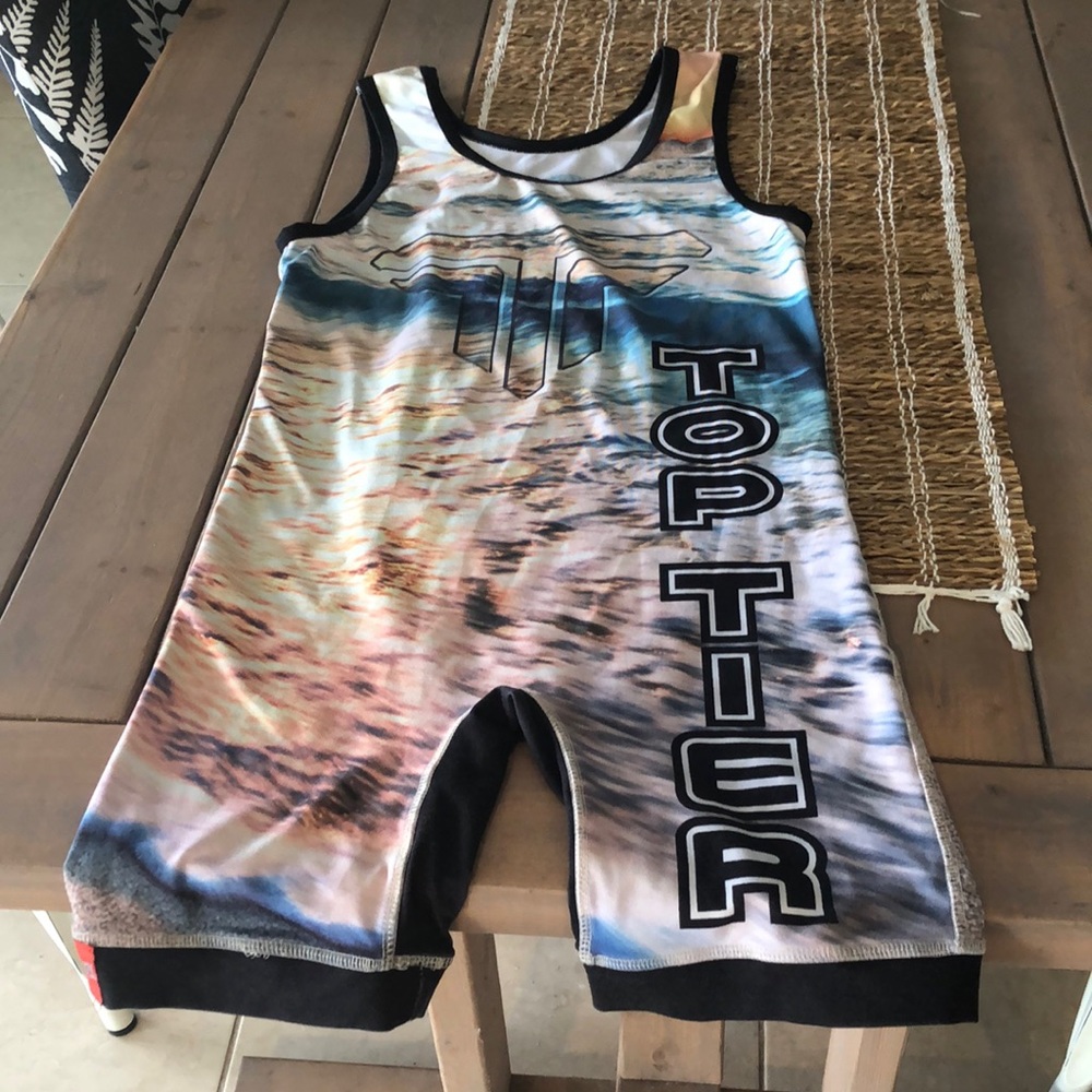 Boys wrestling singlet, size small, weight when worn was 120